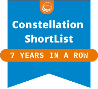 Blue badge with an orange top semicircle and white text: Constellation ShortList. An orange banner across the badge reads 7 YEARS IN A ROW in white letters.