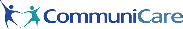 Two stylized human figures form a heart shape next to the word CommuniCare in blue text on a light background.